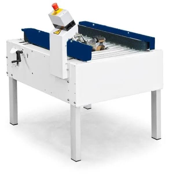 Cyklop case sealer being used on a factory floor